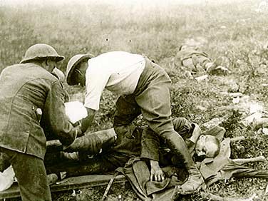 Bringing in a wounded enemy