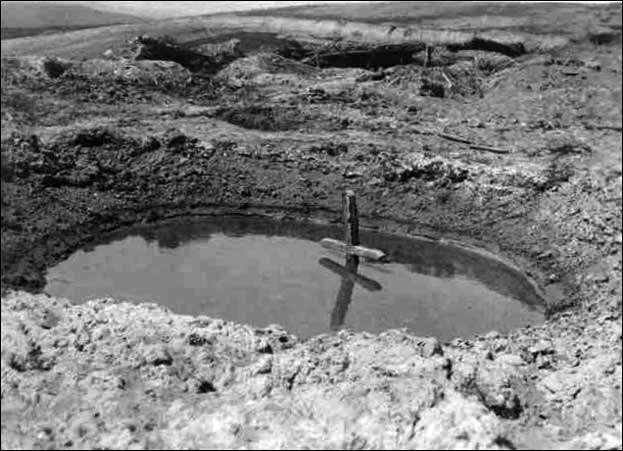 Cross in a shell hole