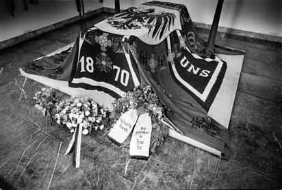 The Kaiser's grave with flowers and banners