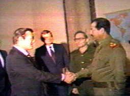 Embracing Saddam Hussein